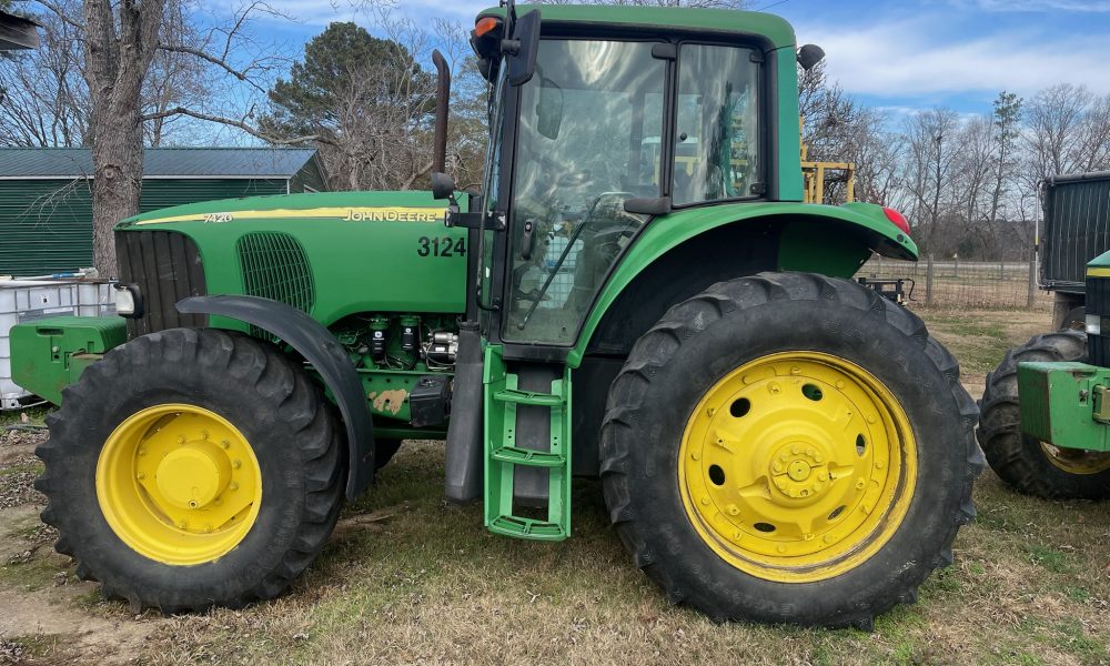 Photo of JOHN DEERE JD 7420 4WD FARM TRACTOR SN:RW7420R039394 WITH ENCLOSED CAB (ROW CROP):