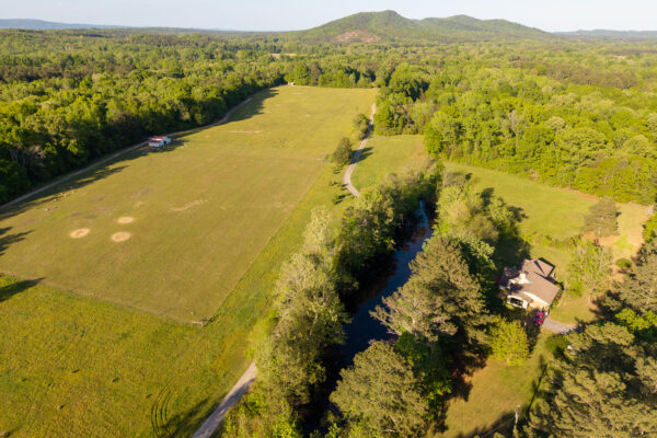 Photo of 116-acres-on-the-coosa-river-with-homes-barns-and-ponds