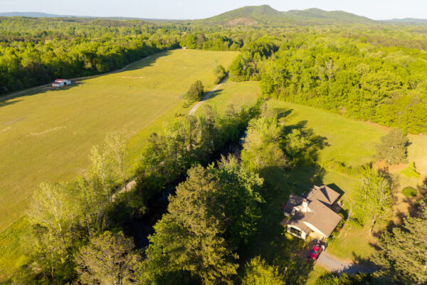 Photo of 116-acres-on-the-coosa-river-with-homes-barns-and-ponds
